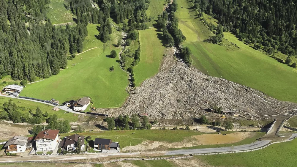 A mudslide covered homes and a street in the Gschnitztal valley in Tyrol, Austria, Tuesday, July 1, 2025. (BFV IBK-Land via AP)