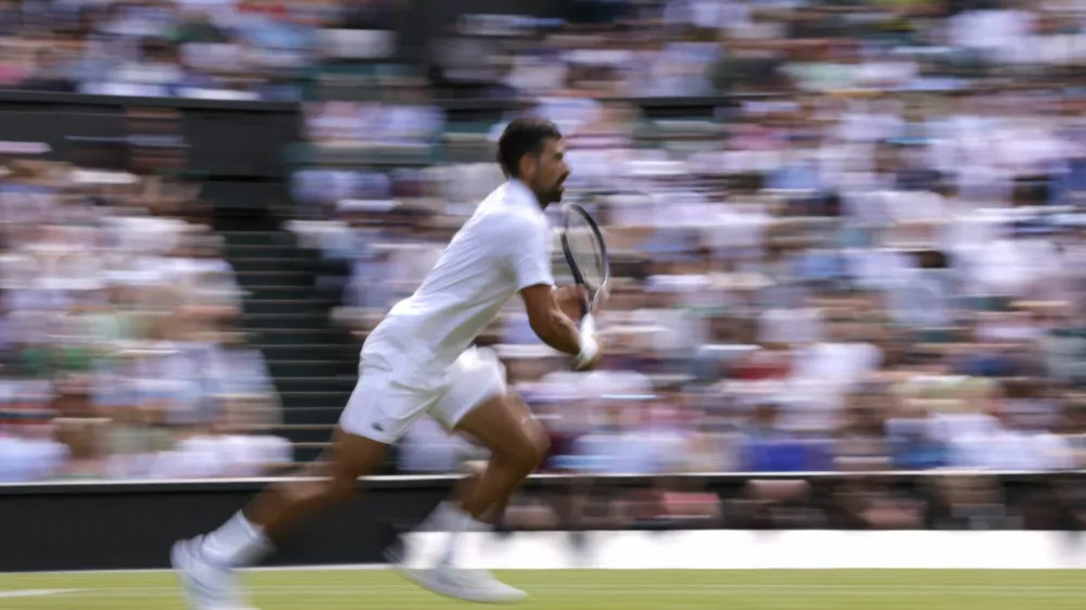 Tennis - Wimbledon - All England Lawn Tennis and Croquet Club, London, Britain - July 3, 2025 Serbia's Novak Djokovic in action during his second round match against Britain's Daniel Evans REUTERS/Andrew Couldridge