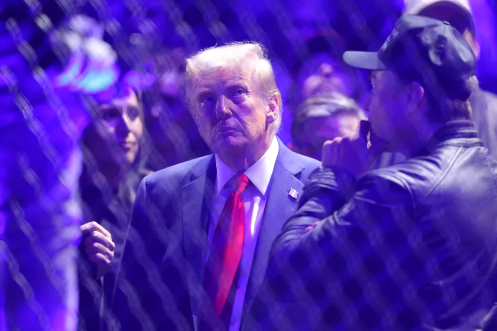 Nov 16, 2024; New York, NY, USA; President-elect Donald Trump and Elon Musk (right) arrive during UFC 309 at Madison Square Garden. Mandatory Credit: Brad Penner-Imagn Images