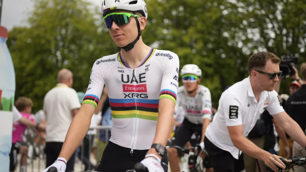 Slovenia's Tadej Pogacar arrives for the start of the first stage of the Tour de France cycling race over 184.9 kilometers (114.9 miles) with start and finish in Lille, France, Saturday, July 5, 2025. (AP Photo/Mosa'ab Elshamy)