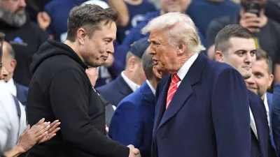 FILE PHOTO: Mar 22, 2025; Philadelphia, PA, USA; Elon Musk and President Donald Trump during the Division I Men's Wrestling Championship held at Wells Fargo Center. Mandatory Credit: Eric Hartline-Imagn Images/File Photo