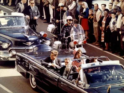 FILE PHOTO: November 22, 1993 will mark the 30th anniversary of the assassination of President John F. Kennedy. President and Mrs. John F. Kennedy, and Texas Governor John Connally ride through Dallas moments before Kennedy was assassinated, November 22, 1963/File Photo