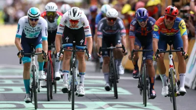 Cycling - Tour de France - Stage 3 - Valenciennes to Dunkirk - Dunkirk, France - July 7, 2025 Soudal Quick-Step's Tim Merlier crosses the finish line to win stage 3 REUTERS/Sarah Meyssonnier