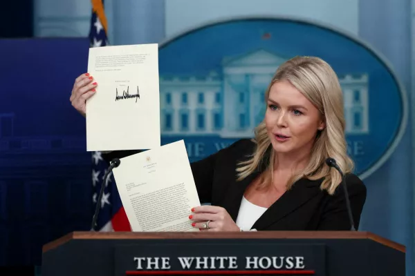 White House Press Secretary Karoline Leavitt shows a signed letter on tariffs from U.S. President Donald Trump to South Korean President Lee Jae Myung during a press briefing at the White House in Washington, D.C., U.S., July 7, 2025. REUTERS/Evelyn Hockstein REFILE - CORRECTING NAME OF LETTER RECIPIENT FROM "JAPANESE PRIME MINISTER SHIGERU ISHIBA" TO "SOUTH KOREAN PRESIDENT LEE JAE MYUNG"   TPX IMAGES OF THE DAY