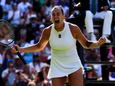 08 July 2025, United Kingdom, London: Belarusian tennis player Aryna Sabalenka celebrates defeating Germany's Laura Siegemund during their women's singles quarter-final match on day nine of the 2025 Wimbledon Championships at the All England Lawn Tennis and Croquet Club. Photo: Ben Whitley/PA Wire/dpa