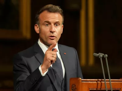French President Emmanuel Macron addresses parliament in the Palace of Westminster, London, Tuesday, July 8, 2025.  Alastair Grant/Pool via REUTERS