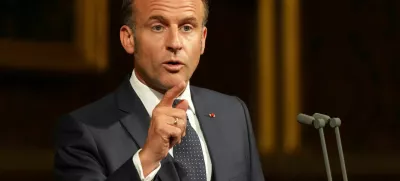 French President Emmanuel Macron addresses parliament in the Palace of Westminster, London, Tuesday, July 8, 2025.  Alastair Grant/Pool via REUTERS