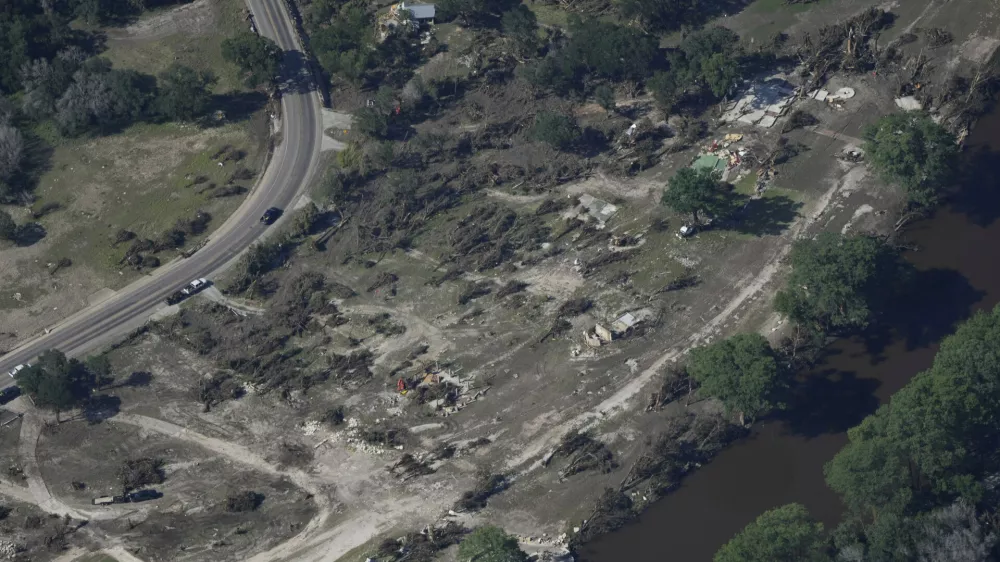 Damage is seen on Tuesday, July 8, 2025, near Ingram, Texas, after a flash flood swept through the area. (AP Photo/Ashley Landis)
