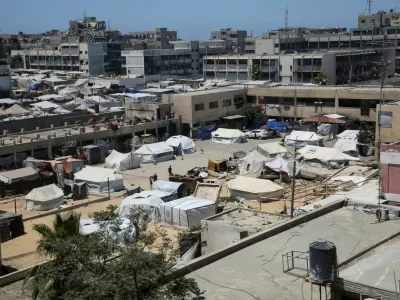 Displaced Palestinians shelter in a tent encampment, in Khan Younis in the southern Gaza Strip July 9, 2025. REUTERS/Hatem Khaled