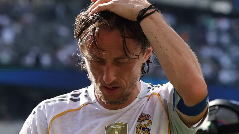 Soccer Football - FIFA Club World Cup - Semi Final - Paris St Germain v Real Madrid - MetLife Stadium, East Rutherford, New Jersey, U.S. - July 9, 2025 Real Madrid's Luka Modric reacts after the match REUTERS/Amanda Perobelli   TPX IMAGES OF THE DAY