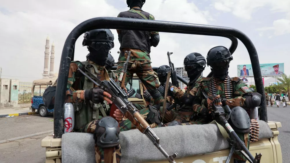 Members of Houthi security forces patrol the site of a demonstration, attended by protesters, predominantly Houthi supporters, in solidarity with Palestinians, in Sanaa, Yemen July 11, 2025. REUTERS/Khaled Abdullah