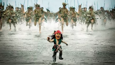 Story from Jam Press (Mini Movies)Pictured: Pirates of the Caribbean. Artist turns celebs into hilarious pint-sized movie stars – and Dua Lipa's a fanMonterrey-based content creator Oscar Hinojosa has a very particular set of skills — the kind that involves making movie heroes small enough to fit in your pocket. Using nothing but Photoshop, a well-timed brownie, and the brainchild of one very tiny dog, Oscar has carved out a delightfully odd digital niche: creating "mini celebrities" from film, sport, and pop culture.His inspiration? A pint-sized pup and a weekend experiment with a "special brownie." Oscar recalls staring at his miniature mutt and thinking, "What would I look like if I were that tiny?" One Photoshop session later, he had his answer. Since then, he's miniaturized everyone from Michael J. Fox in Back to the Future to a shrunken Will Smith fending off miniature monsters in I Am Legend. "It's nostalgic and fun," he says."As long as people keep enjoying it, I'll keep creating." And enjoy it, they do. Oscar's micro-makeovers of Gladiator's Russell Crowe wielding a thimble-sized sword, or Cillian Murphy brooding in a baby Peaky Blinders cap, have earned him thousands of likes and a few celebrity reposts. Finneas (Billie Eilish's brother) is a serial sharer, and Oscar suspects he might be using the mini edits to tease his sister. Meanwhile, Dua Lipa gave one of his posts her stamp of approval — a moment he describes as "surreal."Each piece takes about 30 minutes now (down from an hour), all crafted manually with Adobe Photoshop — no AI, just old-school YouTube learning. While some edits are a breeze, like a tiny Kevin from Home Alone defending his micro-house, others like his tennis-themed pieces or Cristiano Ronaldo lifting a mouse-sized trophy take time and a perfect shot. And what's the most common reaction? "People love it when I mini someone who's already short. I get comments like, 'Where's the edit?'" Oscar laughs. With over 30,000 likes on some posts and a global fanbase, Oscar (also known as Phetru) proves that no dream is too small — literally.ENDS,Image: 1020791308, License: Rights-managed, Restrictions:, Model Release: no