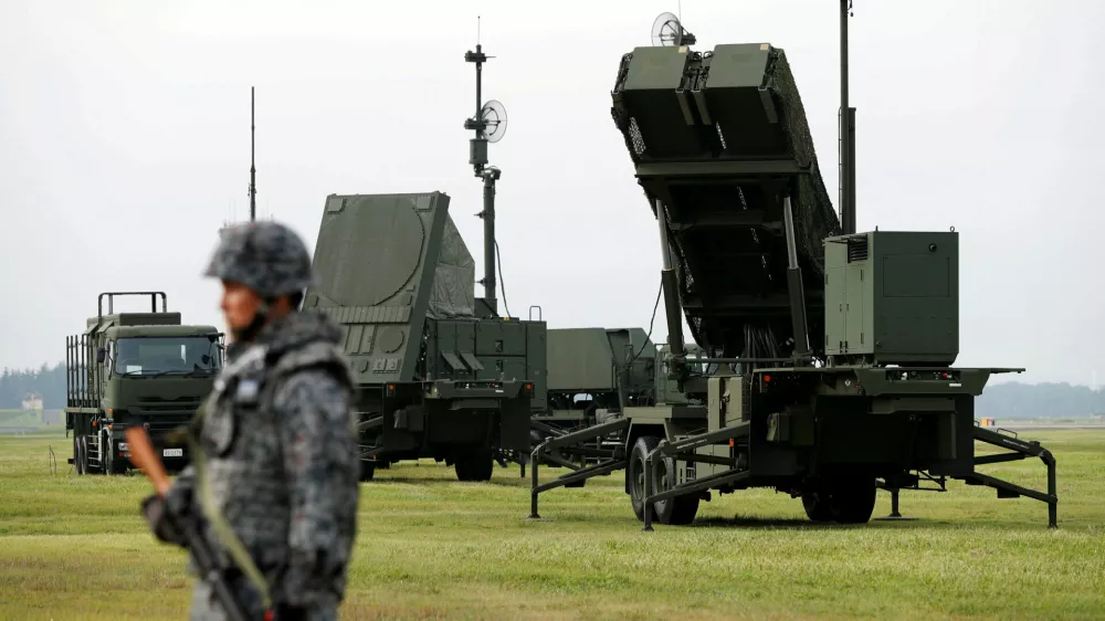 ﻿FILE PHOTO: A Japan Self-Defense Forces (JSDF) soldier takes part in a drill to mobilise their Patriot Advanced Capability-3 (PAC-3) missile unit at U.S. Air Force Yokota Air Base in Fussa on the outskirts of Tokyo, Japan August 29, 2017.  REUTERS/Issei Kato/File Photo