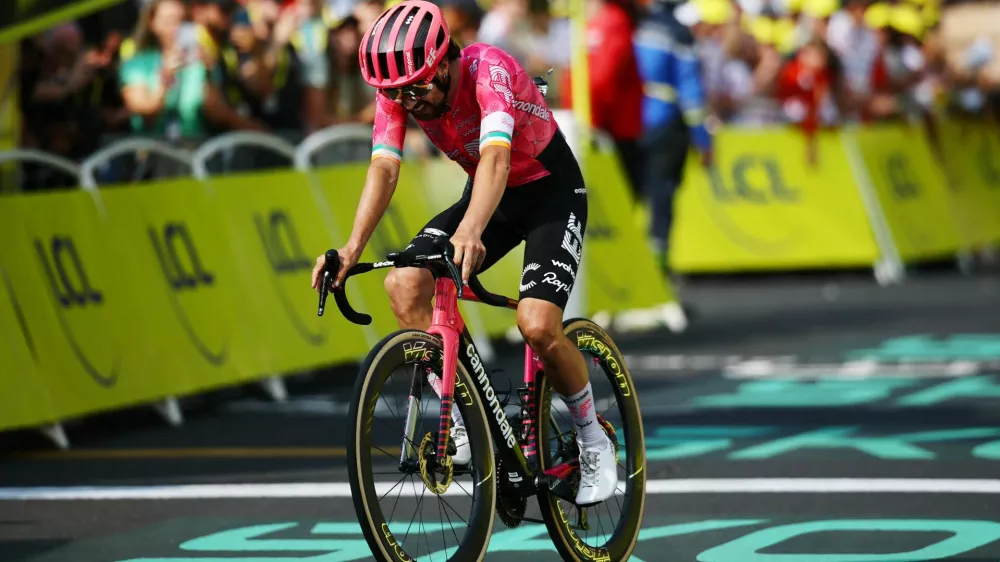 Cycling - Tour de France - Stage 10 - Ennezat to Mont-Dore - Ennezat, France - July 14, 2025 EF Education - EasyPost's Ben Healy reacts after crossing the line in third place in Stage 10 REUTERS/Sarah Meyssonnier