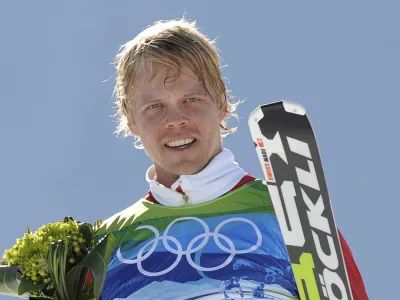 FILE - Audun Groenvold of Norway celebrates after taking third place in the men's skicross competition at the Vancouver 2010 Olympics in Vancouver, British Columbia, Sunday, Feb. 21, 2010. (AP Photo/Mark J. Terrill, File)