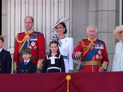 15 June 2024, United Kingdom, London: (L-R) Prince George, William, Prince of Wales, Prince Louis, Catherine, Princess of Wales, Princess Charlotte, King Charles III and Queen Camilla stand on the balcony of Buckingham Palace, to view the flypast following the Trooping the Colour ceremony, as King Charles celebrates his official birthday. Photo: Gareth Fuller/PA Wire/dpa