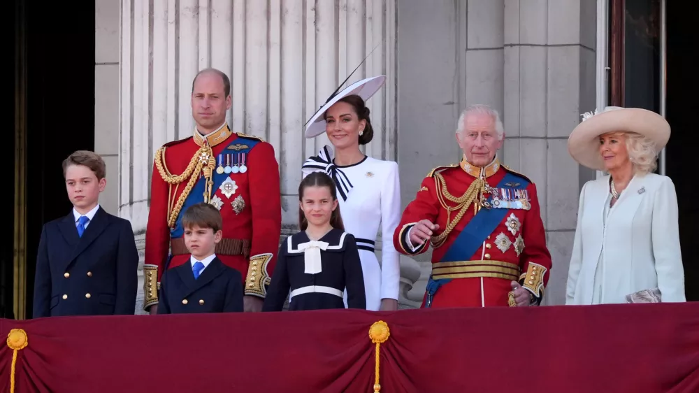 15 June 2024, United Kingdom, London: (L-R) Prince George, William, Prince of Wales, Prince Louis, Catherine, Princess of Wales, Princess Charlotte, King Charles III and Queen Camilla stand on the balcony of Buckingham Palace, to view the flypast following the Trooping the Colour ceremony, as King Charles celebrates his official birthday. Photo: Gareth Fuller/PA Wire/dpa