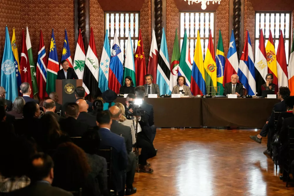 Colombia's President Gustavo Petro, left, delivers a speech during a two-day conference on the Israel-Hamas war and Israel's military actions in Gaza, in Bogota, Colombia, Wednesday, July 16, 2025. (AP Photo/Fernando Vergara)