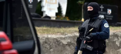 A police officer patrols in the aftermath of a shooting, on the road to Banjska village, Kosovo September 24, 2023. REUTERS/Laura Hasani