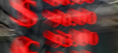 FILE PHOTO: An electronic board shows currency exchange rates of the U.S. dollar and euro against Russian rouble in a street in Moscow, Russia, March 20, 2025. REUTERS/Evgenia Novozhenina/File Photo