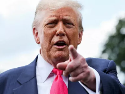 FILE PHOTO: U.S. President Donald Trump speaks with reporters, as he departs for travel to Pennsylvania from the South Lawn at the White House in Washington, D.C. U.S., July 15, 2025. REUTERS/Jonathan Ernst/File Photo/File Photo