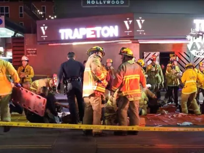 Members of emergency services work at the scene after a vehicle plunged into a crowd outside a nightclub, on Santa Monica Boulevard in the East Hollywood of Los Angeles, California, U.S., July 19, 2025, in this screen grab obtained from social media. AXN NEWS/via REUTERS THIS IMAGE HAS BEEN SUPPLIED BY A THIRD PARTY. MANDATORY CREDIT. NO RESALES. NO ARCHIVES. MUST NOT OBSCURE LOGO.