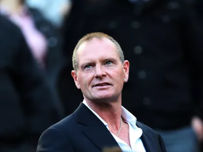 ﻿FILE - In this Sunday, Oct. 16, 2011 file photo, Paul Gascoigne, is seen in the stands ahead of the English Premier League soccer match between Newcastle United and Tottenham Hotspurs at St James' Park, Newcastle, England. Paul Gascoigne's appearance at a charity event, with his hands shaking uncontrollably and a stream of swear words tumbling out of his mouth, has sparked renewed fears about the health of one of England's most talented and popular footballers, with some are even saying his life is in danger. Gordon Taylor, chief executive of the Professional Footballer's Association, said Monday, Feb. 4, 2013, that "he sounds as if he needs almost a 24-hour watching brief at the moment." (AP Photo/Scott Heppell, File)