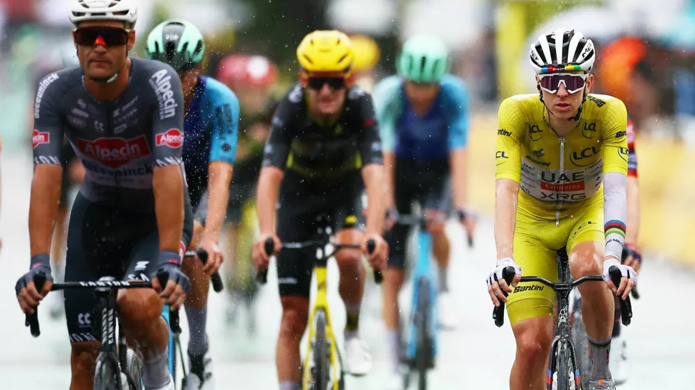 Water Polo - World Aquatics Championships - Women - Gold Medal Match - Greece v Hungary - OCBC Aquatic Centre, Singapore - July 23, 2025 UAE Team Emirates XRG's Tadej Pogacar crosses the finish line with riders after stage 17 REUTERS/Sarah Meyssonnier