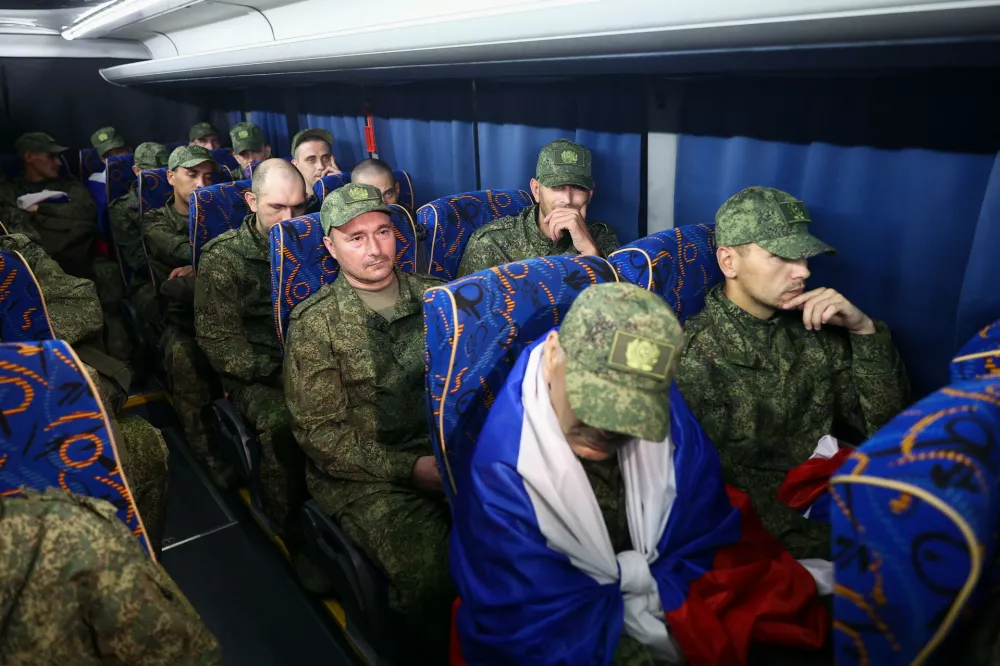 24 July 2025, Russia, ---: Russian army servicemen freed from Ukrainian captivity return home following a recent prisoner exchange between Russia and Ukraine. Photo: Sergei Bulkin/TASS via ZUMA Press/dpa