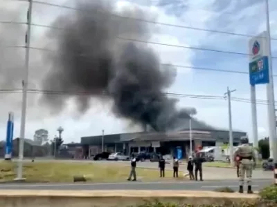 Smoke rises from a convenience store at a gas station, amid the clashes between Thailand and Cambodia, in Kantharalak district, Sisaket province, Thailand, July 24, 2025, in this screengrab obtained from a handout video. TPBS/Handout via REUTERS  THIS IMAGE HAS BEEN SUPPLIED BY A THIRD PARTY. THAILAND OUT. NO COMMERCIAL OR EDITORIAL SALES IN THAILAND.