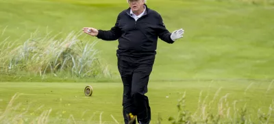 27 July 2025, United Kingdom, Turnberry: US President Donald Trump plays golf at his Trump Turnberry golf course in South Ayrshire, during his five-day private trip to the country. Photo: Jane Barlow/PA Wire/dpa