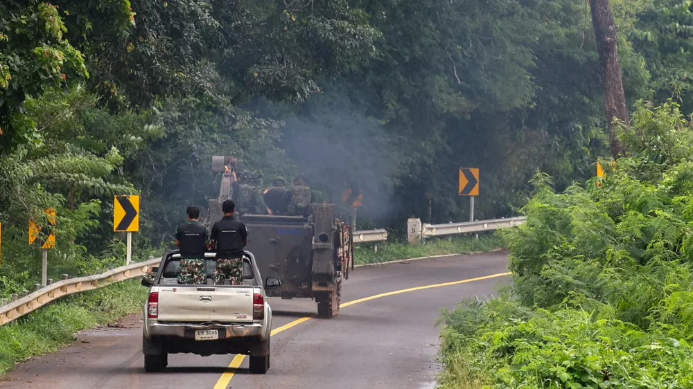 Military vehicles are seen in Sisaket province, as Cambodia and Thailand each said the other had launched artillery attacks across contested border areas early on Sunday, hours after U.S. President Donald Trump said the leaders of both countries had agreed to work on a ceasefire, Thailand, July 27, 2025. REUTERS/Athit Perawongmetha