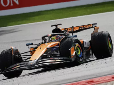 McLaren driver Oscar Piastri of Australia steers his car during the Formula One Grand Prix at the Spa-Francorchamps racetrack in Spa, Belgium, Sunday, July 27, 2025. (AP Photo/Geert Vanden Wijngaert)