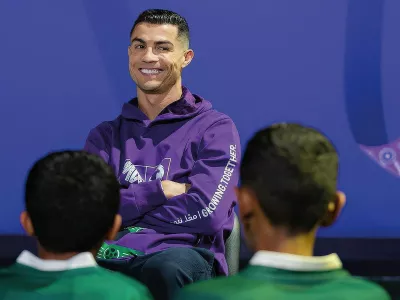 Christiano Ronaldo changes his famous jersey number 7 to number 34, the year of the upcoming FIFA World Cup, as he celebrates, in Riyadh, on December 11, 2024.,Image: 945898152, License: Rights-managed, Restrictions:, Model Release: no