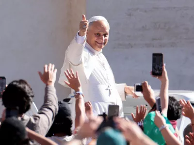 Pope Leo XIV gestures on the day he holds general audience in St. Peter's Square, at the Vatican, July 30, 2025. REUTERS/Remo Casilli   TPX IMAGES OF THE DAY