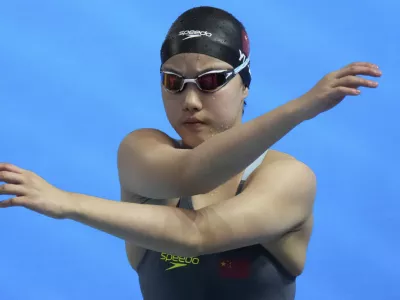 Yu Zidi of China prepares to compete in the women's 200-meter butterfly final at the World Aquatics Championships in Singapore, Thursday, July 31, 2025. (AP Photo/Lee Jin-man)