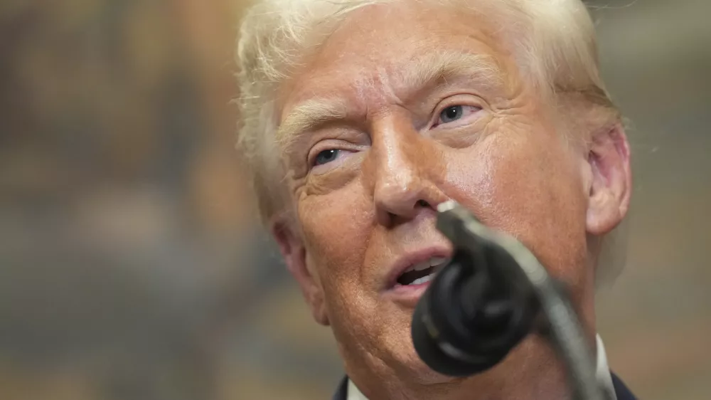 President Donald Trump speaks during an event to sign an executive order restarting the Presidential Fitness Test in public schools, Thursday, July 31, 2025, in the Roosevelt Room of the White House in Washington. (AP Photo/Jacquelyn Martin)