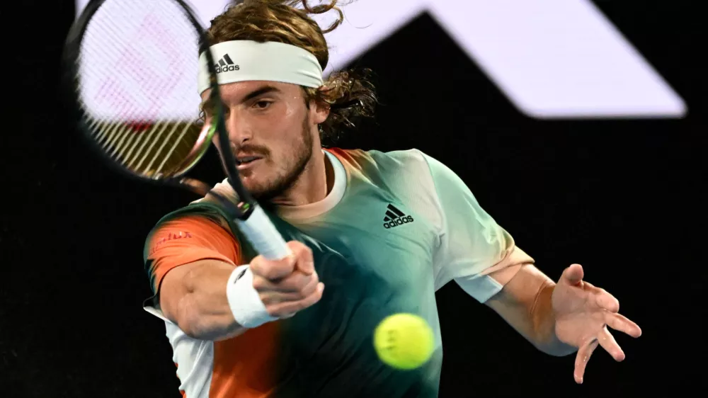 ﻿Tennis - Australian Open - Melbourne Park, Melbourne, Australia - January 26, 2022 Greece's Stefanos Tsitsipas in action during his quarter final match against Italy's Jannik Sinner REUTERS/Morgan Sette