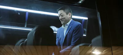 Texas State Rep. Gene Wu sits in a bus after Democratic lawmakers from Texas held a press conference, after leaving their state to deny Republicans the quorum needed to redraw the state's 38 congressional districts, in Carol Stream, Illinois, U.S. August 3, 2025. REUTERS/Tom Krawczyk