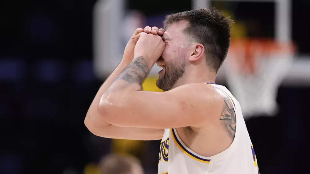 Los Angeles Lakers guard Luka Doncic reacts to a foul call that went against him during the first half in Game 1 of an NBA first-round playoff series against the Minnesota Timberwolves, Saturday, April 19, 2025, in Los Angeles. (AP Photo/Mark J. Terrill)