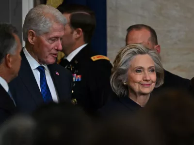 WASHINGTON, DC - JANUARY 20: Former President Bill Clinton and former Secretary of State Hillary Clinton arrive at the 60th inaugural ceremony where Donald Trump will be sworn in as the 47th president on January 20, 2025, in the US Capitol Rotunda in Washington, DC. Ricky Carioti/Pool via REUTERS