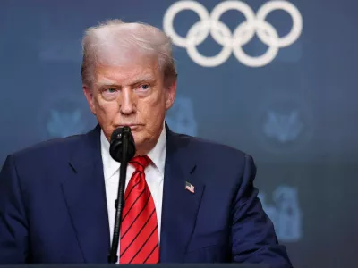 U.S. President Donald Trump delivers remarks after signing an executive order to create a White House Olympics task force to handle security and other issues related to the LA 2028 summer Olympic games in the South Court Auditorium on the White House campus in Washington, D.C., U.S., August 5, 2025. REUTERS/Jonathan Ernst    TPX IMAGES OF THE DAY