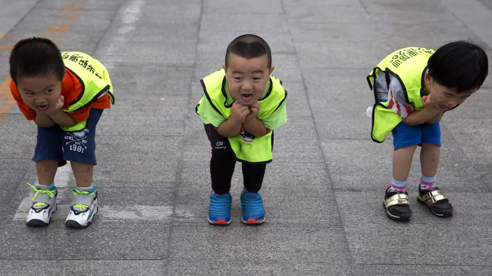 ﻿Children practice their postures during a roller blading class outside a park in Beijing, China, Wednesday, June 24, 2015. Roller blading has grown in popularity as instructors and equipment become more easily available in the Chinese capital.  (AP Photo/Ng Han Guan)