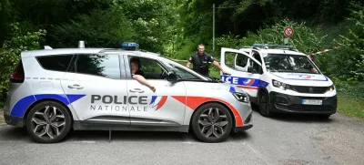 Police France, francija, policija, french police, francoska policijaPolice cars are parked in front of a cordoned-off area, near a sports field where a 32-year-old man was found dead with his throat slit and gutted, in Pont-de-Metz on August 4, 2025. The victim had stab wounds to the neck and back and has been found by a walker in a cross position, police told AFP.,Image: 1027676326, License: Rights-managed, Restrictions:, Model Release: no