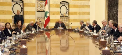 In this photo, released by the Lebanese Presidency press office, Lebanese president Joseph Aoun, centre, leads a Cabinet meeting which supposed to discuss the disarmament of Hezbollah, at the presidential palace in Baabda, east of Beirut, Lebanon, Thursday, Aug. 7, 2025. (Lebanese Presidency press office via AP)