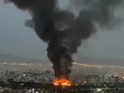 Smoke rises from a fire, as the Israel-Iran air war continues, in Tehran, Iran, in this still image obtained from social media video released June 17, 2025. Social Media/via REUTERS THIS IMAGE HAS BEEN SUPPLIED BY A THIRD PARTY. NO RESALES. NO ARCHIVES. NEWS USE ONLY