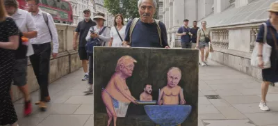 Satirical artist Kaya Mar, displays his latest painting depicting President Trump, Russian President Putin and Ukraine's President Zelenskyy, outside Downing Street, in London, Wednesday, Aug. 13, 2025. (AP Photo/Joanna Chan)
