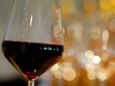 FILE PHOTO: A glass of French red wine is displayed at the Chateau du Pavillon in Sainte-Croix-Du-Mont, France, July 29, 2019. REUTERS/Regis Duvignau/File Photo