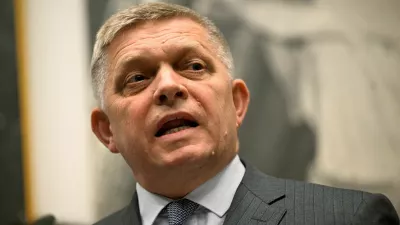 FILE PHOTO: Slovakia's Prime Minister Robert Fico attends a press conference, as he marks the anniversary of his attempted assassination, at the site of the attack, in Handlova, central Slovakia May 15, 2025. REUTERS/Radovan Stoklasa/File Photo