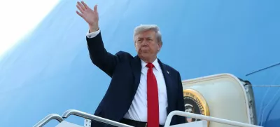 U.S. President Donald Trump boards Air Force One as he departs for Alaska to meet with Russian President Vladimir Putin to negotiate for an end to the war in Ukraine, from Joint Base Andrews in Maryland, U.S., August 15, 2025. REUTERS/Kevin Lamarque